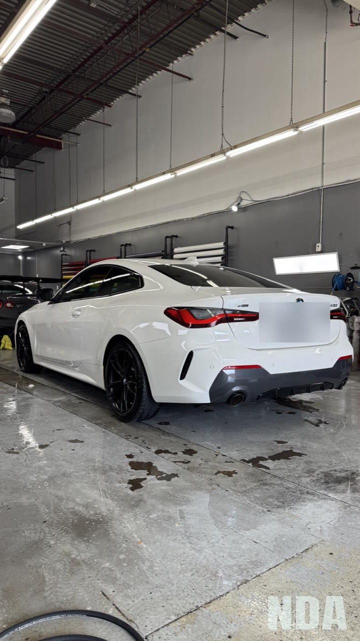 white BMW 430i xDrive Coupe