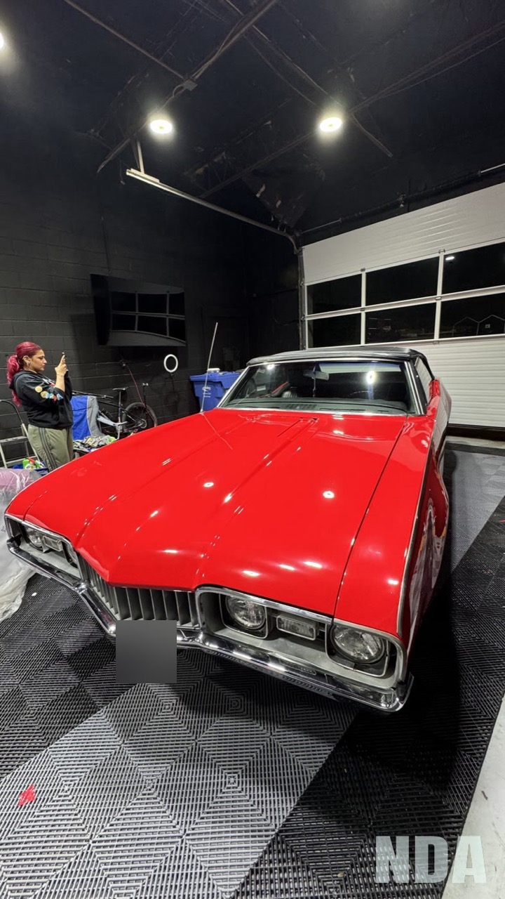 red Oldsmobile Cutlass