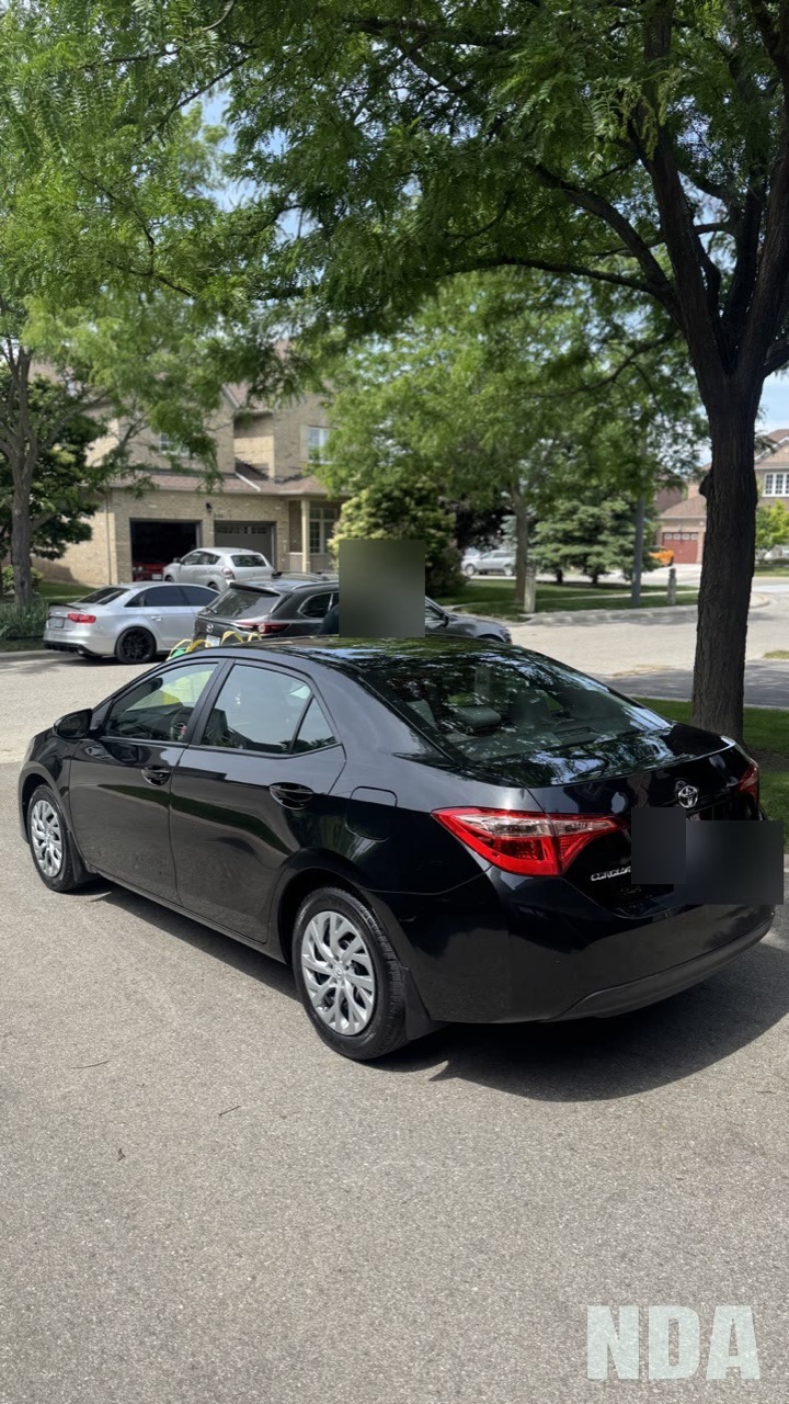 black Toyota Corolla