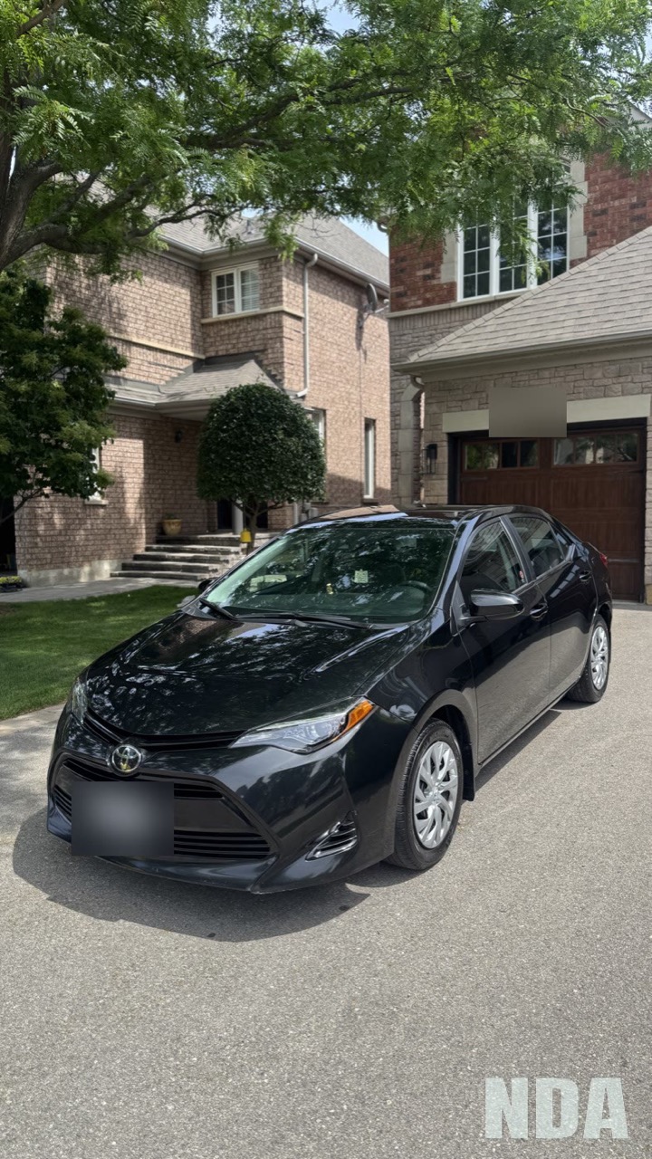 black Toyota Corolla