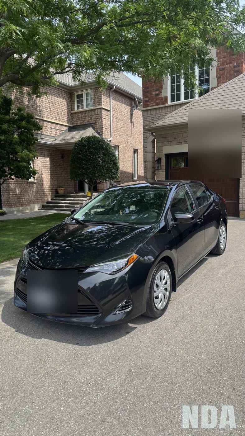 black Toyota Corolla