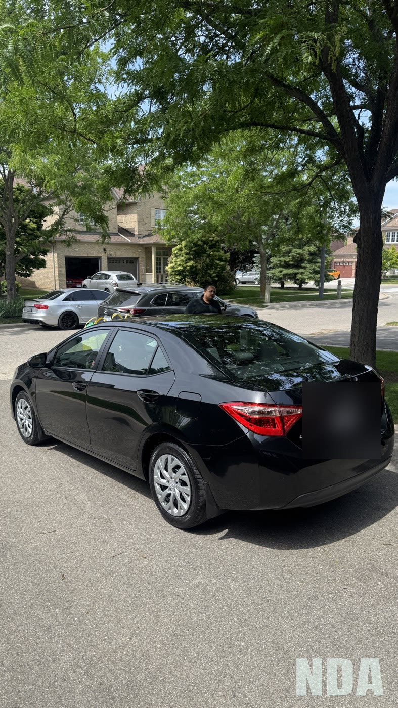 black Toyota Corolla