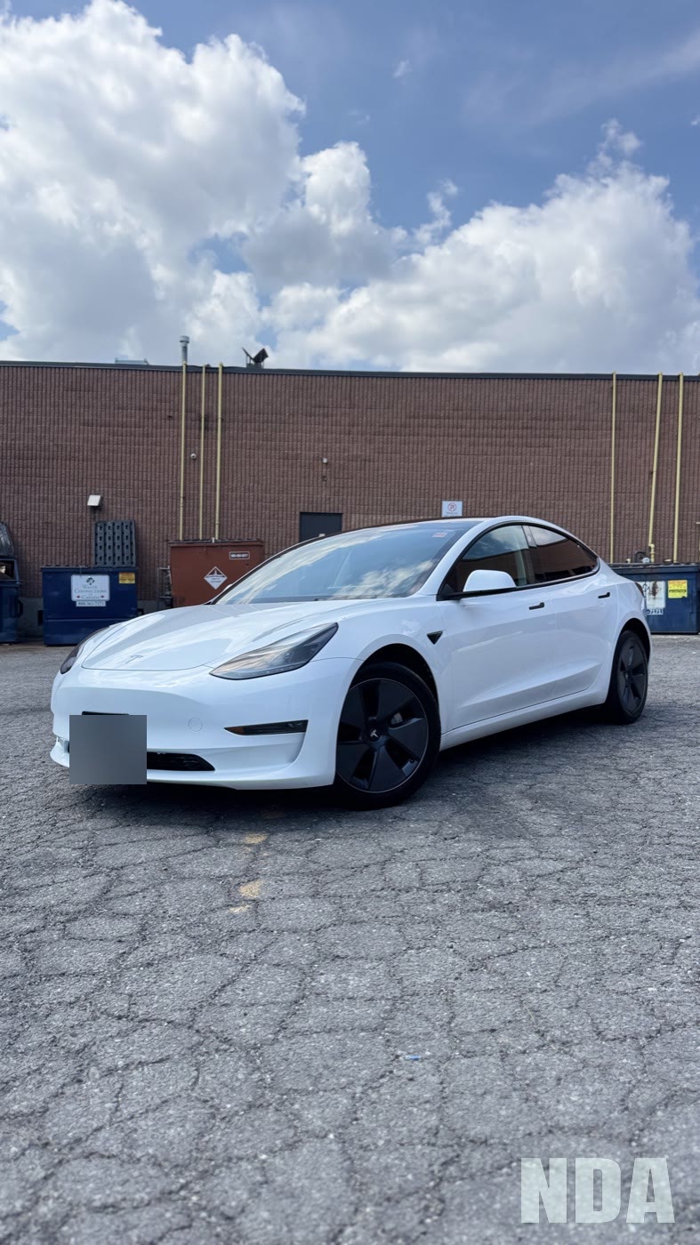 white Tesla Model 3